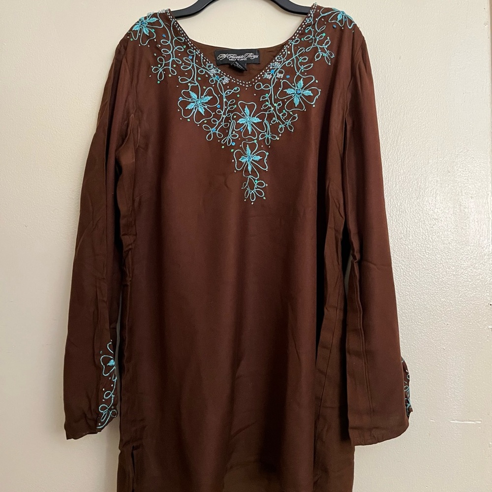 Colleen Lopez long tops.